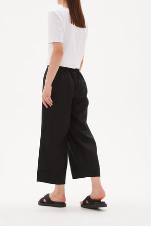 Tirelli knit blouse feminine tailored chic modern wear