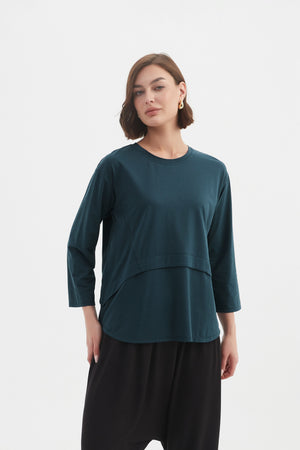Tirelli sleeveless blouse chic draped neutral style