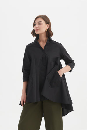 Tirelli knit blouse tailored chic feminine modern