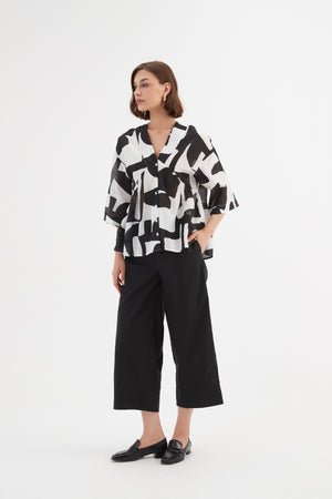 V NECK PEPLUM TOP