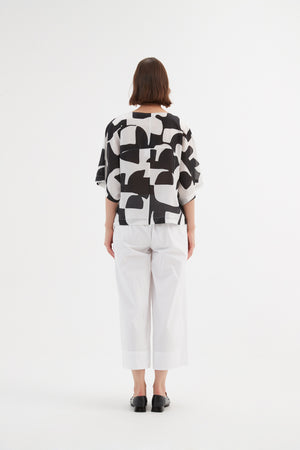 Tirelli cropped blouse casual chic feminine soft neutral
