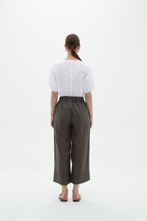 Tirelli knit blouse tailored chic soft drape neutral wear