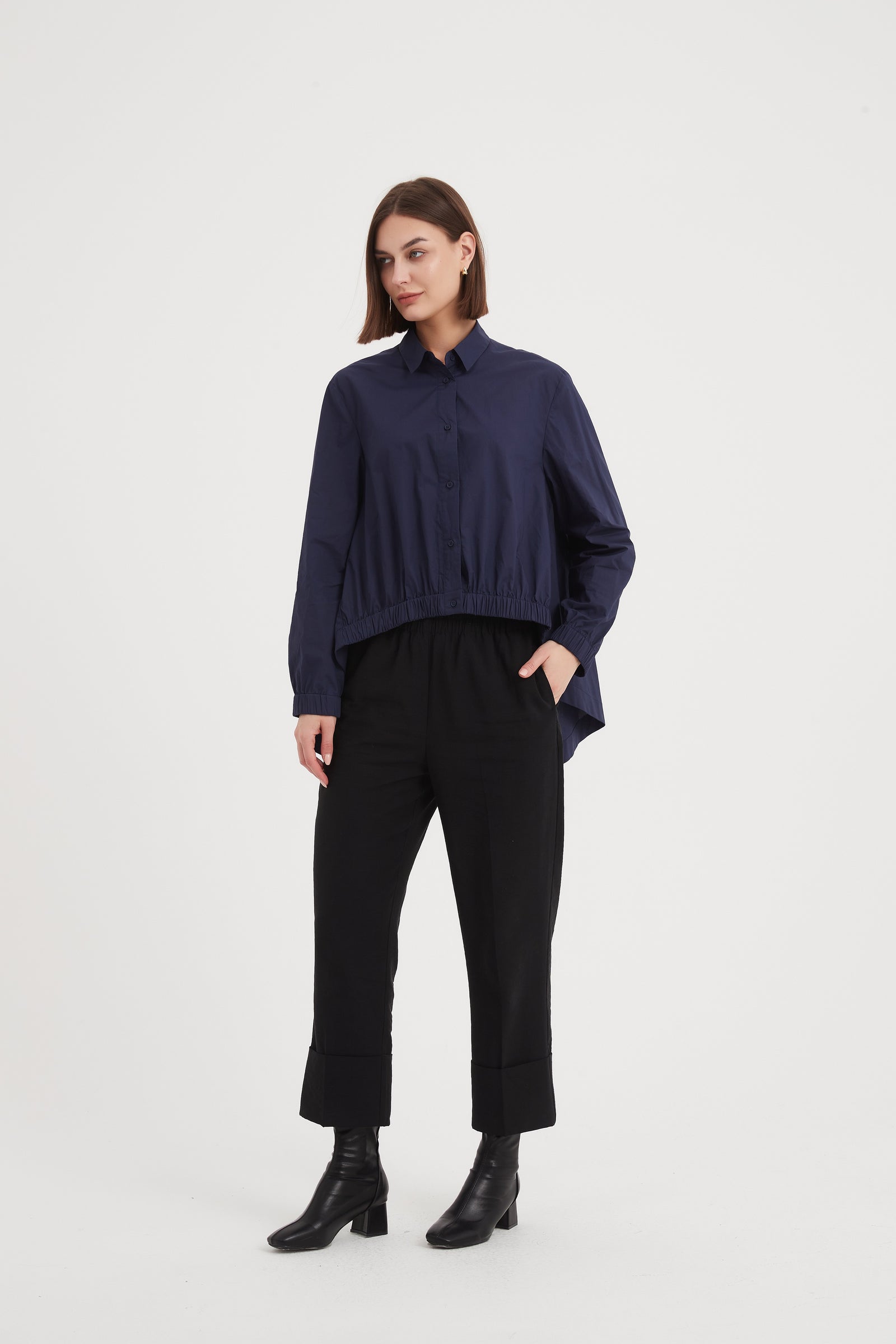 Classic black tuxedo jacket with satin peak lapels for formal evening events.