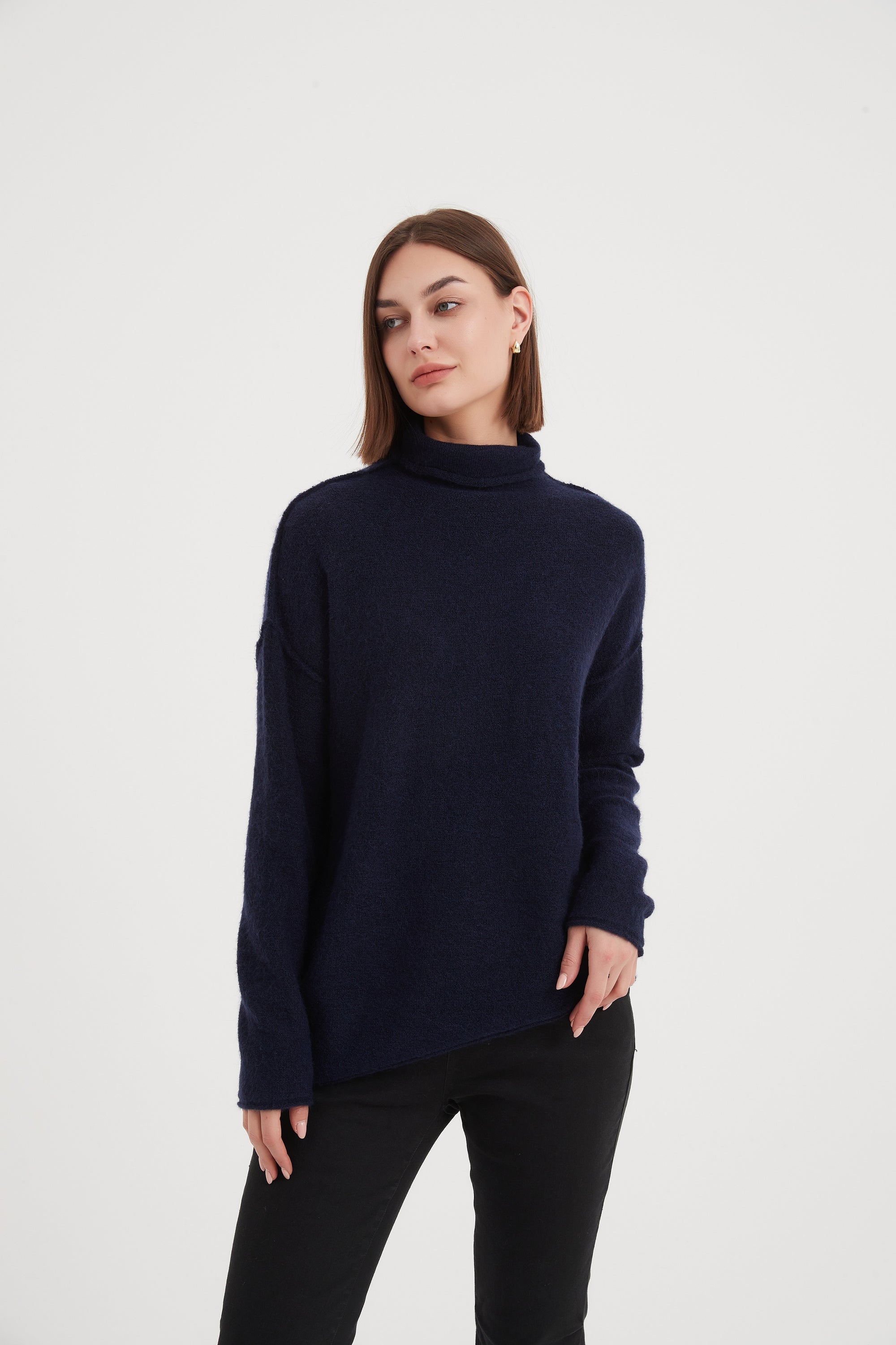EXPOSED SEAM FUNNEL NECK KNIT