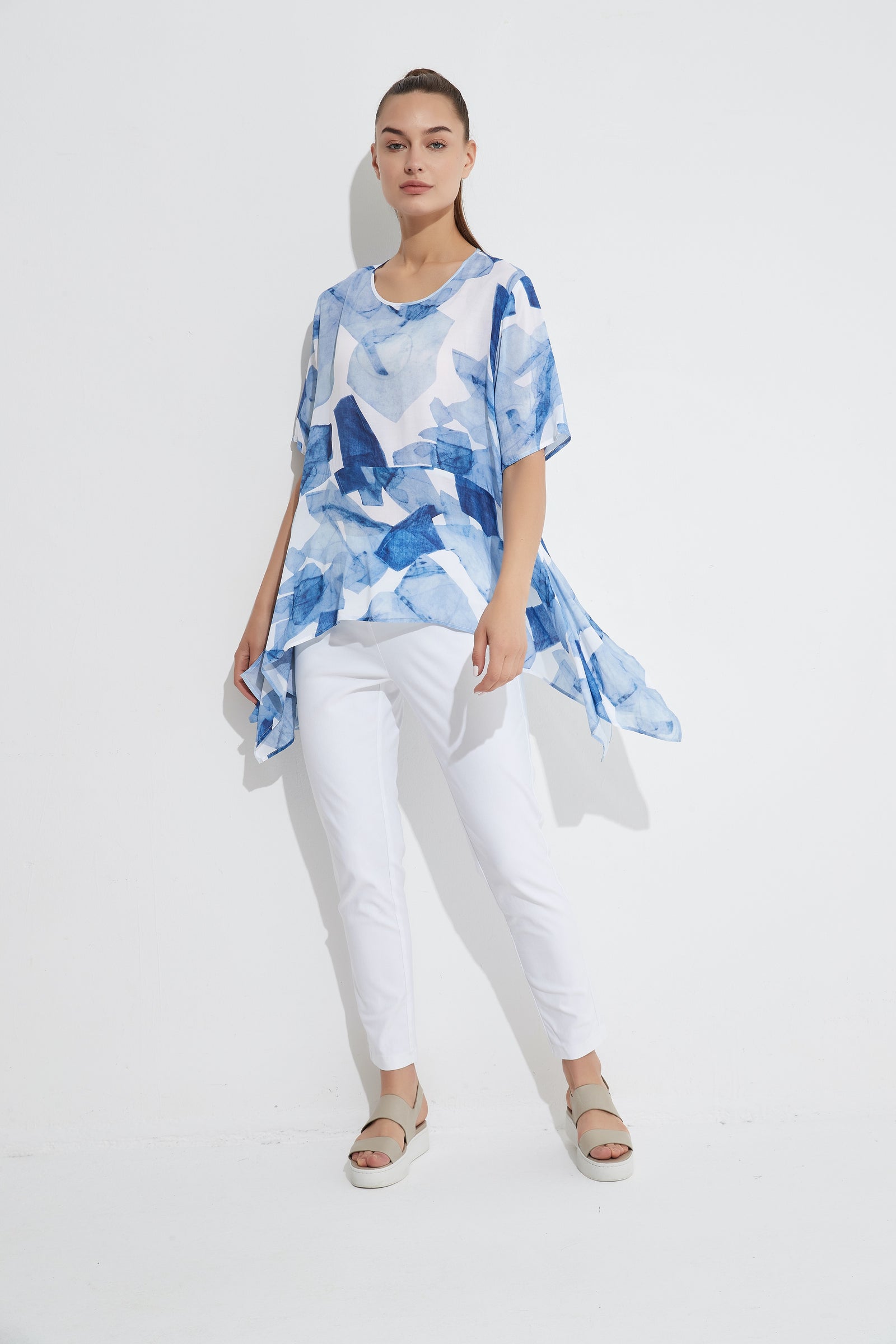 EXAGGERATED HEM TOP