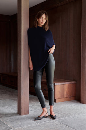SLEEVELESS TUNIC