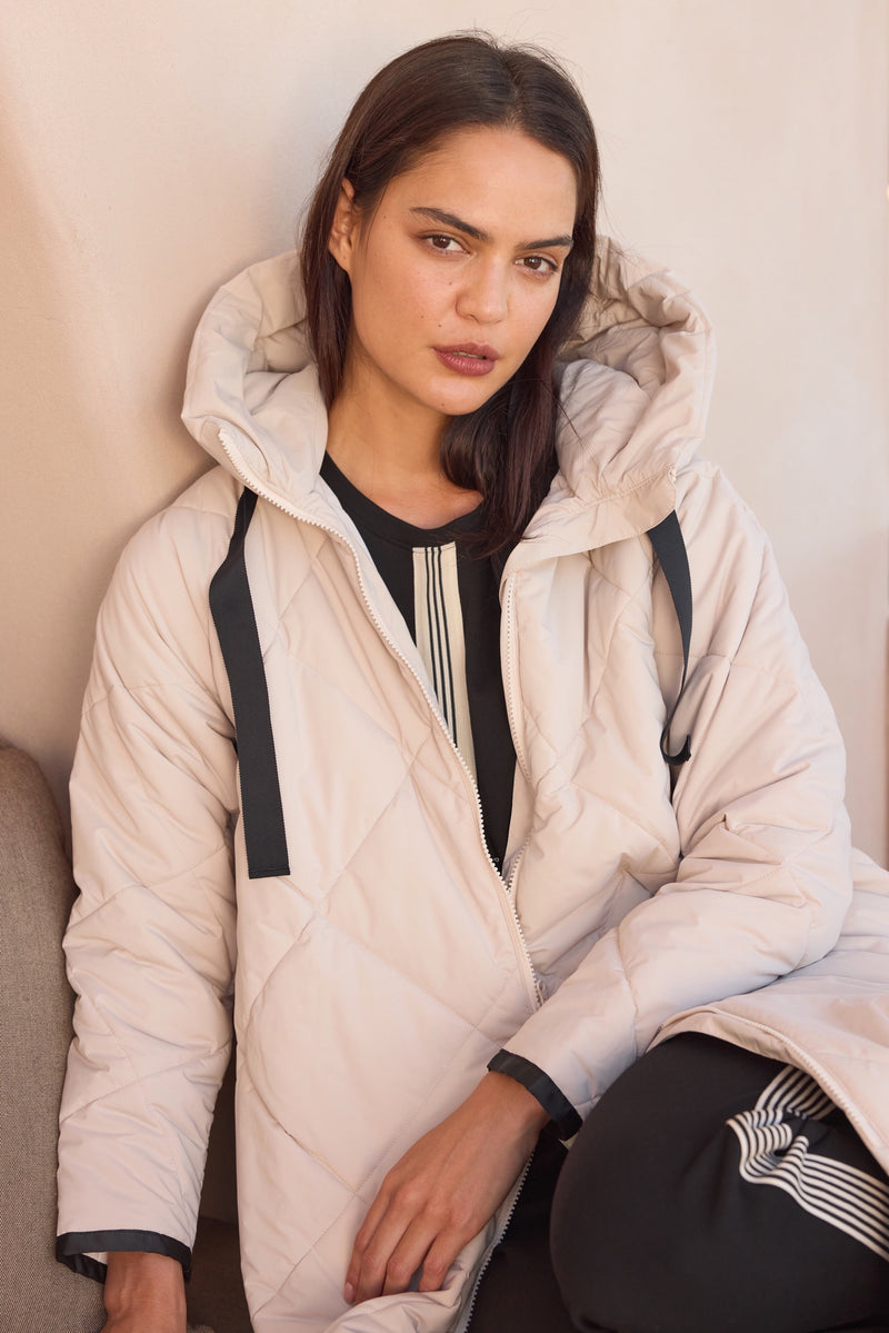 Women's Quilted Longline Puffer Jacket | Zip Hem Winter Coat Cream