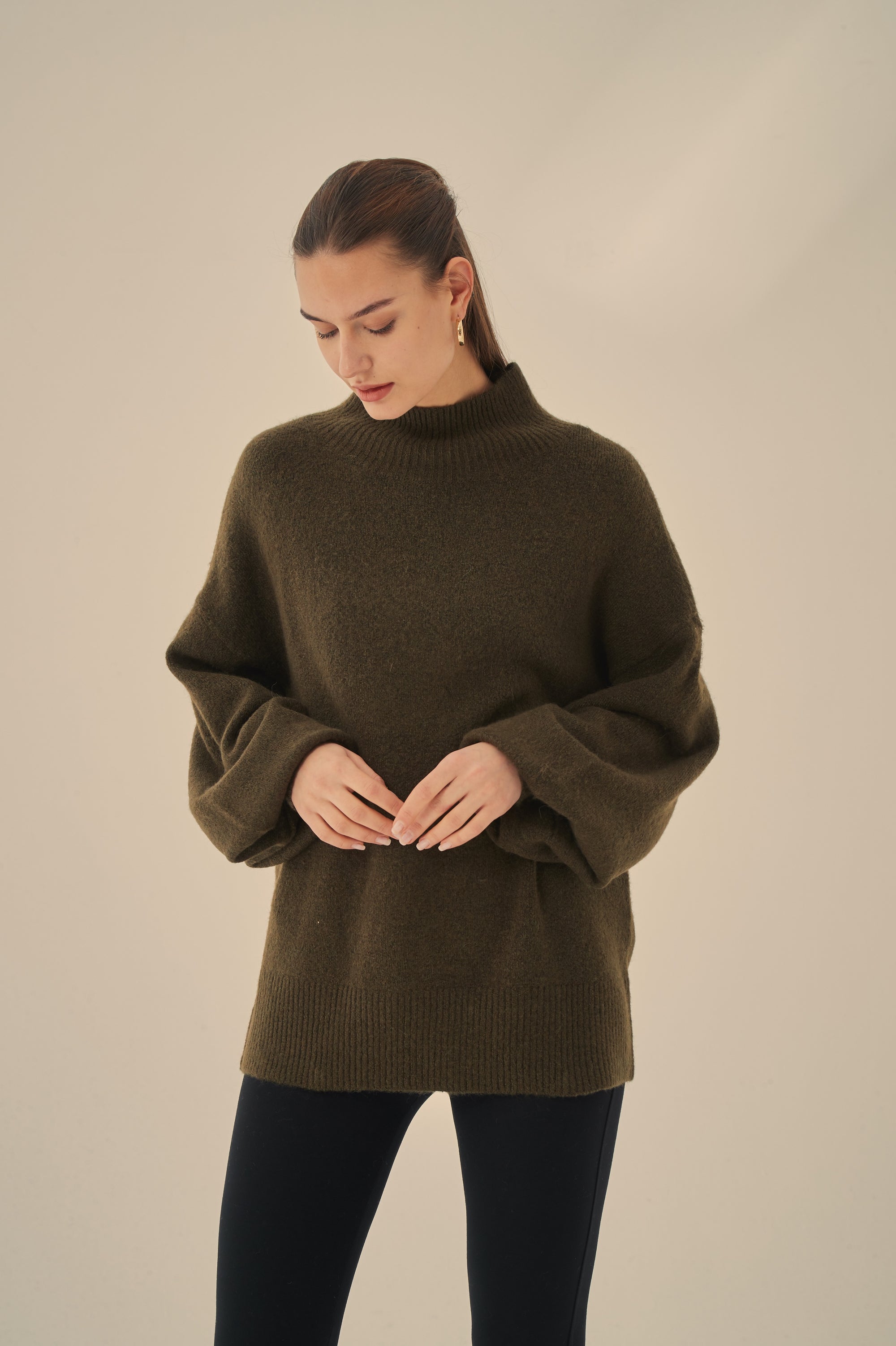 STATEMENT SLEEVE KNIT