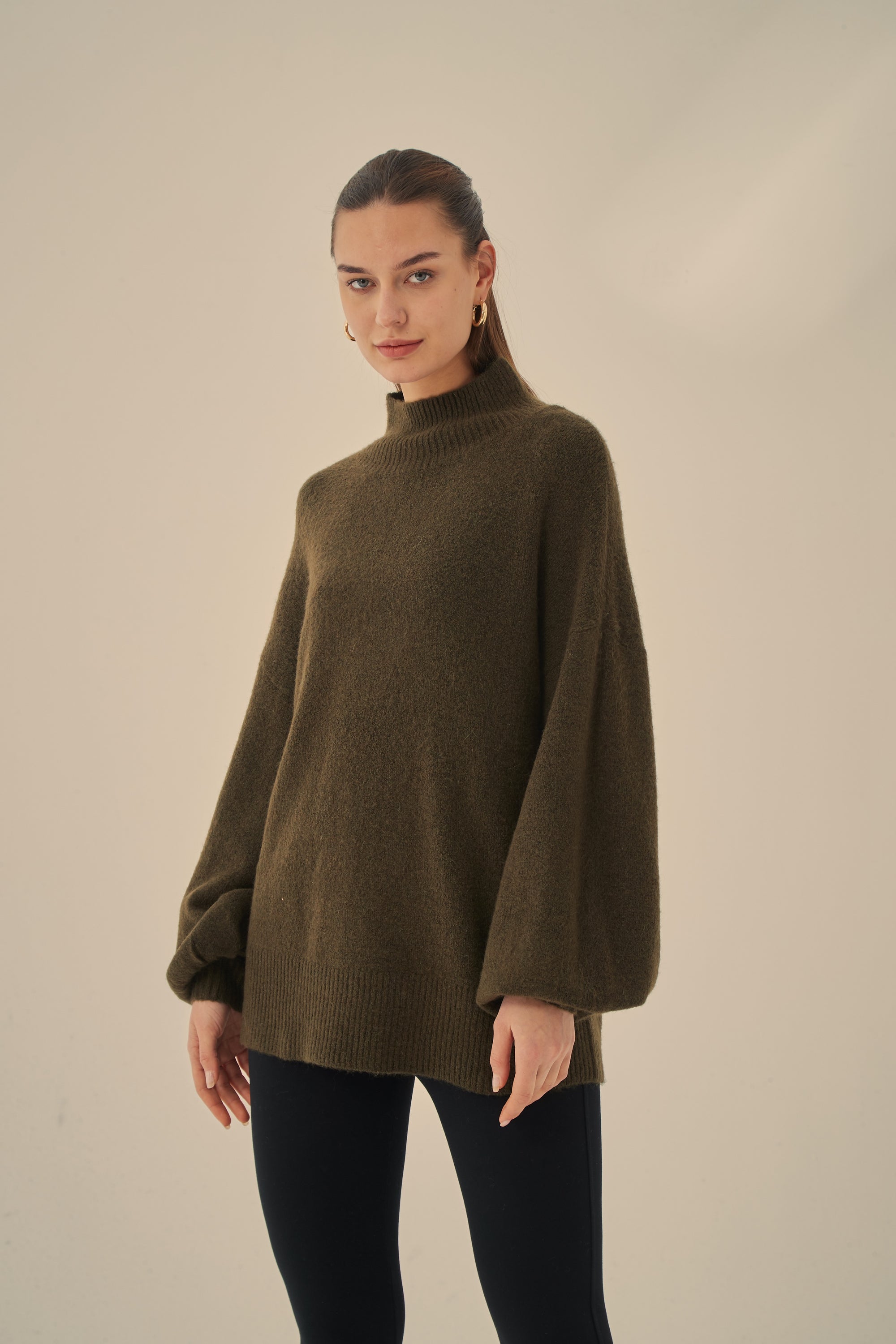 STATEMENT SLEEVE KNIT